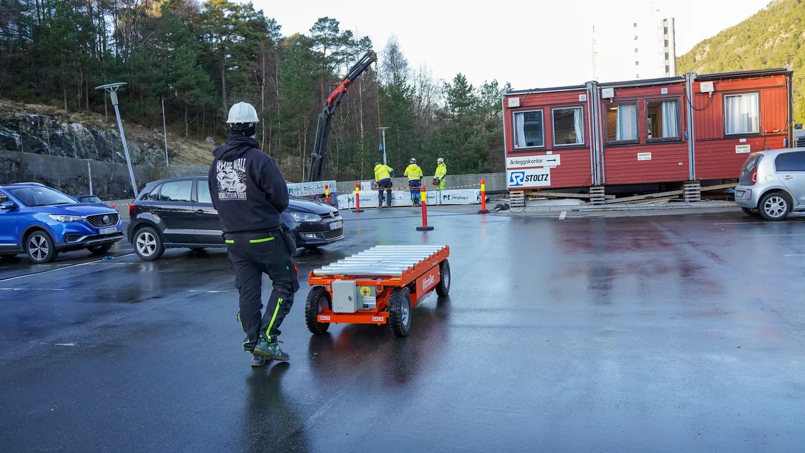 Liftroller E Wagon carrying materials through a corridor during a refurbishment
