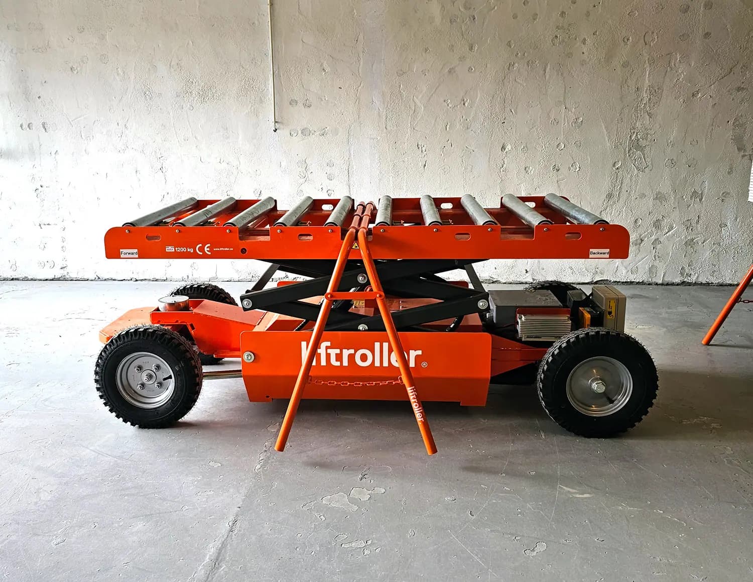 Correct placement of a Liftroller Trestle on the deck of a material wagon