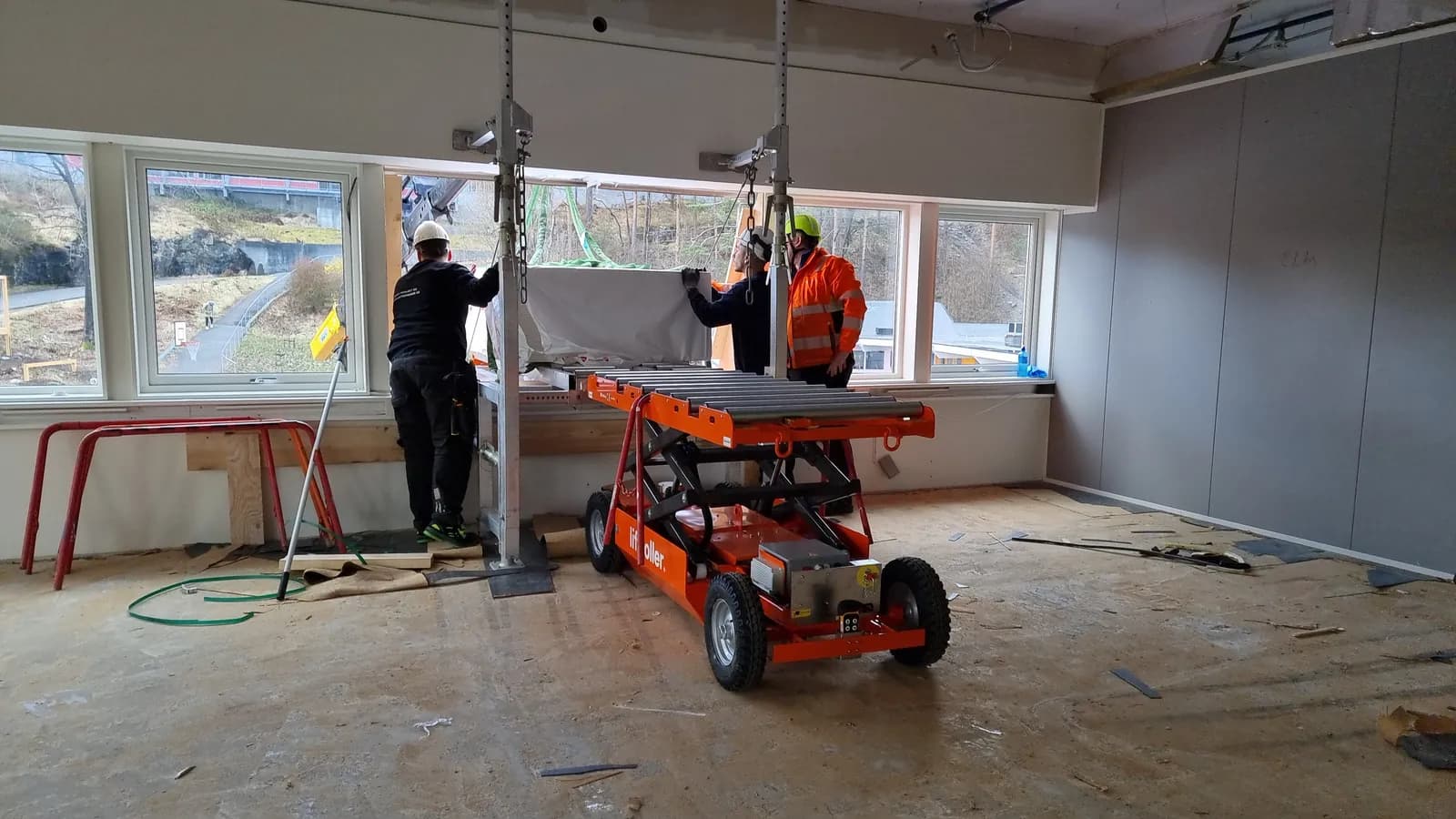 Liftroller Wall installed in a building undergoing renovation, viewed from inside the floor